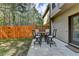 Cozy patio with outdoor seating and a fenced-in yard, perfect for relaxing and entertaining at 5870 Shiloh Woods Dr, Cumming, GA 30040