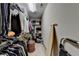 The walk-in closet boasts ample clothing storage options, providing organization for any wardrobe at 5870 Shiloh Woods Dr, Cumming, GA 30040