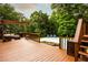 Spacious deck provides the perfect spot for outdoor entertaining, lounging, and poolside relaxation at 1020 Travitine Trl, Loganville, GA 30052