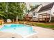 Home's beautiful backyard with pool, deck and patio provides multiple entertainment options for Gathering and friends at 1020 Travitine Trl, Loganville, GA 30052
