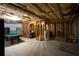 Spacious unfinished basement featuring exposed beams and a blank canvas for future living space at 1020 Travitine Trl, Loganville, GA 30052