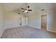 Large carpeted main bedroom with a high ceiling and walk-in closet at 10961 Big Sky Dr, Hampton, GA 30228