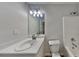 Modern bathroom featuring single sink vanity, mirror, modern fixtures, toilet and bathtub at 2352 Benson Rdg, Lithonia, GA 30058