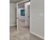 Neutral bedroom with carpet featuring a door with view into a large window at 2352 Benson Rdg, Lithonia, GA 30058