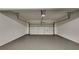 Spacious garage with ample room for parking and storage, ready for your personal touch at 2352 Benson Rdg, Lithonia, GA 30058