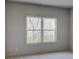 Bedroom featuring a large window with a view of the outdoors at 3066 Reserve Ct Sw, Conyers, GA 30094