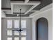 Modern living room with custom ceiling, fan, and large windows at 3066 Reserve Ct Sw, Conyers, GA 30094