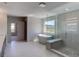 Luxurious main bathroom featuring shower, soaker tub, and dual vanity at 3066 Reserve Ct Sw, Conyers, GA 30094