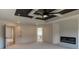 Large main bedroom with ceiling detail, fireplace, and ensuite bathroom at 3066 Reserve Ct Sw, Conyers, GA 30094