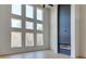 Living room with floor to ceiling windows and modern fireplace at 3066 Reserve Sw Ct, Conyers, GA 30094