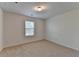Neutral bedroom with carpet, a window with blinds, and ample natural light at 3168 Sag Harbor Ct, Buford, GA 30519