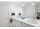 Bright bathroom featuring double sinks with a large mirror, providing ample space for morning routines at 68 Willow Ne Gln, Atlanta, GA 30342