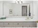 Bright bathroom vanity with a large mirror, ample counter space, and elegant fixtures at 68 Willow Ne Gln, Atlanta, GA 30342