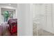 Bedroom with hardwood floors and a glimpse into a well-organized walk-in closet at 68 Willow Ne Gln, Atlanta, GA 30342