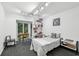 Cozy bedroom featuring a bed, desk, and a bright window with natural light at 68 Willow Ne Gln, Atlanta, GA 30342