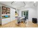 Bright craft room with lots of storage, a large window, and plenty of workspace for creative projects at 68 Willow Ne Gln, Atlanta, GA 30342