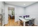 Cozy dining area with a square table set for four, adjacent to the bright and modern kitchen at 68 Willow Ne Gln, Atlanta, GA 30342