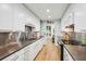 Spacious kitchen with sleek cabinetry, stainless steel countertops, and modern appliances at 68 Willow Ne Gln, Atlanta, GA 30342