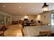 Bright living room area with plenty of seating and multiple tables at 68 Willow Ne Gln, Atlanta, GA 30342