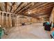 Large unfinished basement with exposed framing, offering potential for customization and expansion at 131 Forsyth Park Ln, Woodstock, GA 30188