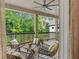 Outdoor deck featuring patio furniture with a wooded view at 131 Forsyth Park Ln, Woodstock, GA 30188