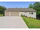 Detached two-car garage featuring ample parking space and convenient side access at 131 Forsyth Park Ln, Woodstock, GA 30188