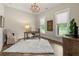 Charming office space with hardwood floors, natural light and a decorative chandelier at 131 Forsyth Park Ln, Woodstock, GA 30188