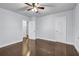 Bedroom with hardwood floors, neutral paint, ceiling fan, and bright natural light at 1747 Parkhill Dr, Decatur, GA 30032