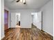Bedroom with wood-look floors and doorways that lead to other rooms in the home at 1747 Parkhill Dr, Decatur, GA 30032