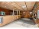 Inside the barn, find spacious stalls, natural wood finishes, and ample storage at 2203 Arbor Hill Rd, Canton, GA 30115