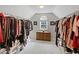 Spacious walk-in closet with custom shelving and storage solutions at 2203 Arbor Hill Rd, Canton, GA 30115