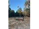 Scenic equestrian arena featuring a jump with a hot air balloon in the sky at 2203 Arbor Hill Rd, Canton, GA 30115