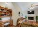 Living room featuring a fireplace, sofa, and built-in shelving with desk space at 2203 Arbor Hill Rd, Canton, GA 30115