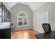 Office featuring hardwood floors, bright light from a large window, and modern decor at 2203 Arbor Hill Rd, Canton, GA 30115