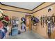 Rustic tack room with saddles and bridles hanging neatly on the walls at 2203 Arbor Hill Rd, Canton, GA 30115