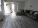 Bright living room featuring hard surface flooring and neutral paint at 244 Hilltop Sw Dr, Atlanta, GA 30315