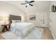 Bedroom with vaulted ceilings, queen sized bed and an area rug at 245 Scotch Pine Ct, Alpharetta, GA 30022