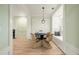 The dining room has a small dining table and four dining chairs at 245 Scotch Pine Ct, Alpharetta, GA 30022