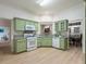 Bright, airy kitchen featuring modern appliances and countertops at 245 Scotch Pine Ct, Alpharetta, GA 30022