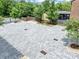 A backyard with a large, newly paved area and decorative trees, great for outdoor activities at 701 Pryor Sw St # 5, Atlanta, GA 30315