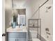 Modern bathroom featuring a vanity with a gray cabinet, a sink, and tiled shower at 701 Pryor Sw St # 5, Atlanta, GA 30315