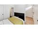 Bedroom features half-painted wall, queen bed and access to hallway and bathroom at 701 Pryor Sw St # 5, Atlanta, GA 30315