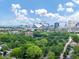 Beautiful skyline view with green trees and sky in the foreground and a modern stadium in the background at 701 Pryor Sw St # 5, Atlanta, GA 30315