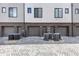 Exterior view of modern townhomes with brick accents and garage doors, offering a stylish and contemporary look at 701 Pryor Sw St # 5, Atlanta, GA 30315