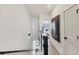 Upstairs hallway leading to bedrooms, featuring hardwood floors and modern fixtures at 701 Pryor Sw St # 5, Atlanta, GA 30315