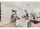 Open concept kitchen featuring a large center island, modern pendant lighting, and stainless steel appliances at 701 Pryor Sw St # 5, Atlanta, GA 30315