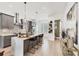 Modern kitchen features gray cabinets, stainless steel appliances, and a spacious white island with barstool seating at 701 Pryor Sw St # 5, Atlanta, GA 30315