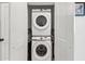 Closet laundry area with stacked, modern white washer and dryer at 701 Pryor Sw St # 5, Atlanta, GA 30315