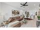 Open-concept living room with hardwood floors, a modern kitchen, and comfortable furnishings at 701 Pryor Sw St # 5, Atlanta, GA 30315