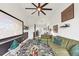 A bright living room features stylish zebra rug, comfortable seating, an entertainment center, and ample natural light at 701 Pryor Sw St # 5, Atlanta, GA 30315